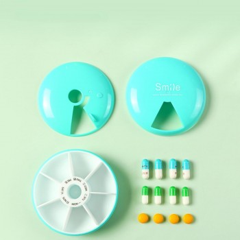 Кругла кишенькова таблетниця на 7 днів Smile Box, голуба
